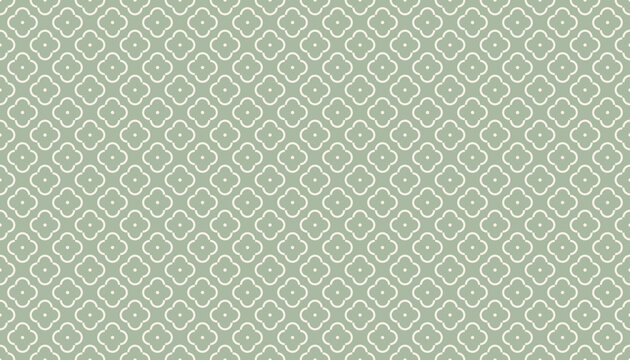Seamless Moroccan quatrefoil lattice pattern in cream on sage green