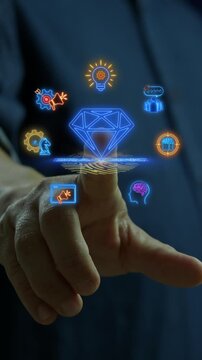 Businessman finger touching glowing diamond gem hub node vertical shot with corporate network icons. Corporate brand value equity, premium business reputation prestige, and valuation concept idea.