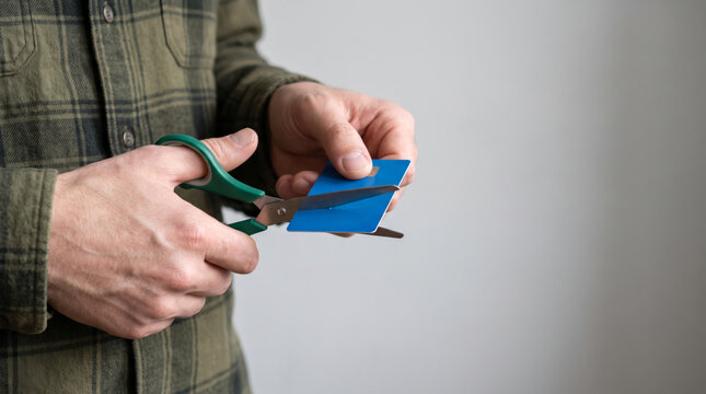 Scissors cut card for credit payment preparation. Finance crisis recession problem. bankruptcy bankrupt destroy loss, debt loan pay spending poverty