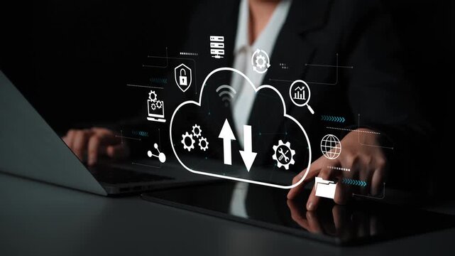Professional Businessperson Engaging in Cloud Computing with Digital Icons Representing Data Exchange and Technology Over a Laptop in a Dark Environment. Entropy.