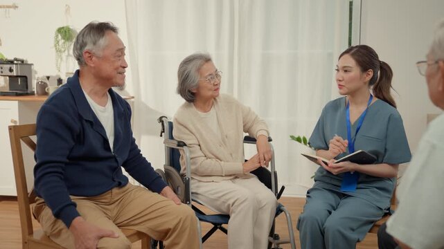 Senior group sharing elderly social interaction care meeting home interior warm conversation support calm setting in family room with caregiver and peers