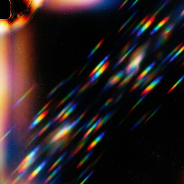 Light Leak small rainbow prism flares scattered diagonally, light leak effect for photo and poster design, lens flare texture, film burn background, digital design resource for creative projects