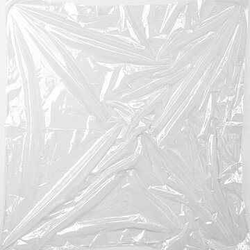 Plastic Wrap Overlay film with large glossy highlight patches, plastic wrap effect for photo and poster design, cellophane texture, transparent background, digital design resource