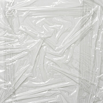 Plastic Wrap Overlay stretched film with directional tension lines, plastic wrap effect for photo and poster design, cellophane texture, transparent background, digital design resource