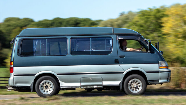 Milton Keynes; UK - Sept. 26th 2026: 1991 Toyota Hiace motorhome driving on a British road