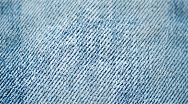 Light blue denim fabric texture with visible diagonal weave pattern