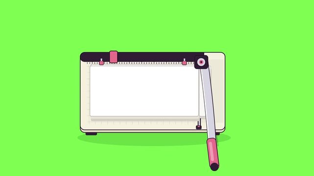 A paper trimmer cuts a sheet of white paper with a sharp blade.