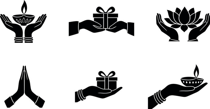 Set of black silhouette icons featuring human hands holding gifts lotus flowers and traditional oil lamps for cultural celebrations
