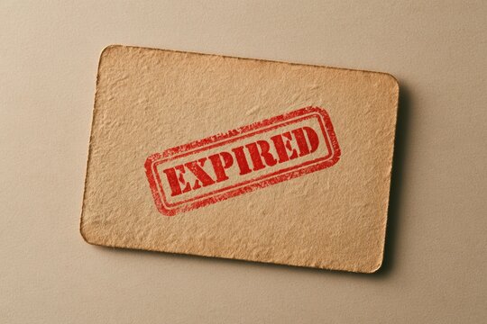 Brown textured paper with a red expired rubber stamp, showing end of validity