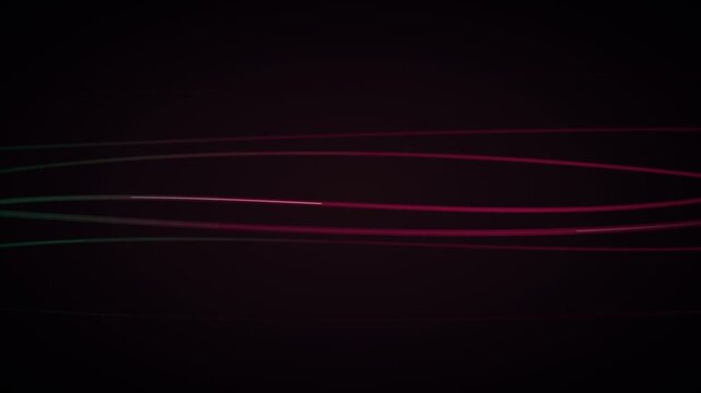 Abstract glowing neon lines moving horizontally on a dark background. Ideal for technology presentations, sci-fi video backgrounds, web design, cybersecurity, and digital network visual concepts.