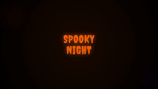 Spooky night orange glowing text animation on dark background