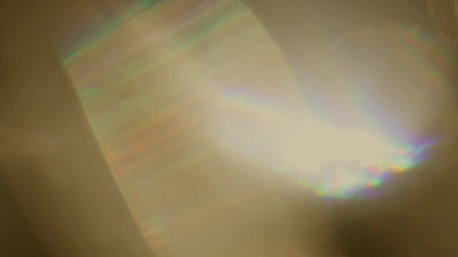 Abstract light leak gradient glowing  flare sunlight refraction with radiance illumination lens effect. Artistic and dynamic golden background for futuristic design.