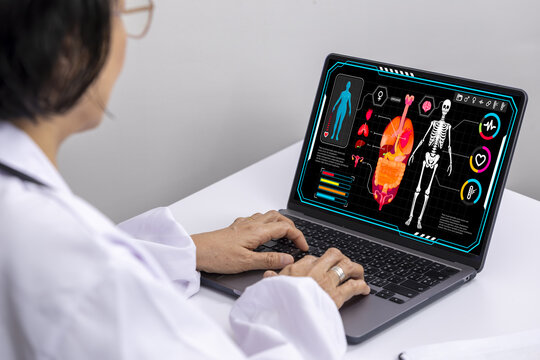 Medical professional technology laptop digital health human anatomy skeleton heart healthcare innovation analysis futuristic data monitoring diagnostic science research modern hospital clinic