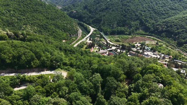 Drone View of Ovcar Banja, Serbia, Spa Center Buildings, Roads, River and Green Landscape on Sunny Summer Day