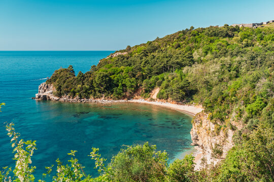 A beautiful hidden Mogren beach cove on a sunny day, Budva