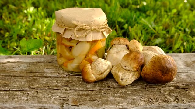 Preservation of chanterelle mushrooms in a jar. Selective focus.