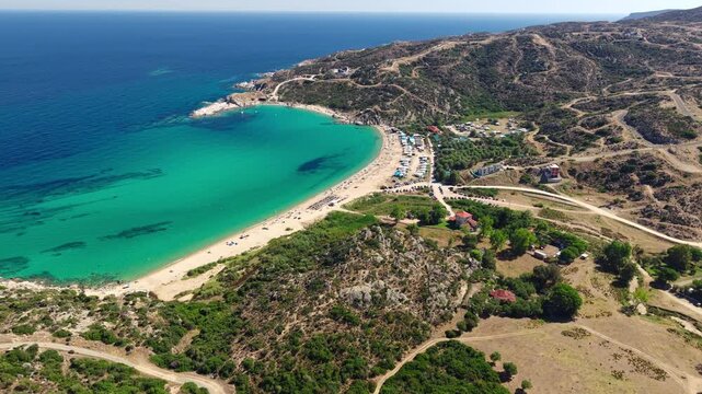 Drone View of Sandy Beach and Turquoise Sea on Coast of Greece on Hot Summer Day