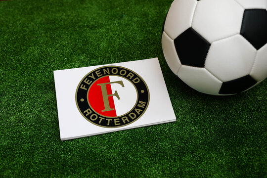 A football on the grass and the Feyenoord Rotterdam Football Club logo. September 30, 2026.