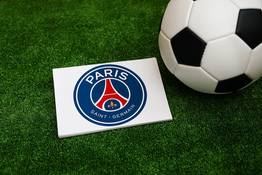 A football on the grass and the Paris Saint-Germain Football Club logo. September 30, 2026.