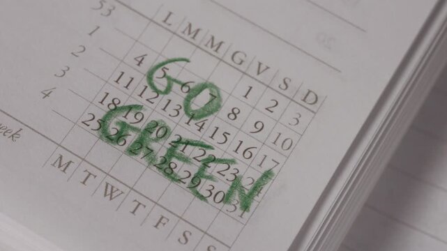 GO GREEN a phrase on calendar