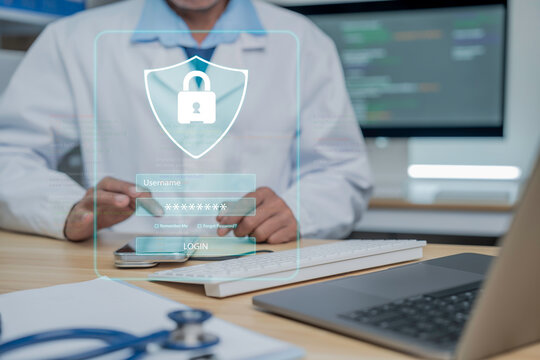 Medical professional is using a laptop in a medical data workspace, accompanied by a digital security padlock icon that symbolizes patient data protection, cybersecurity in healthcare and secure medic