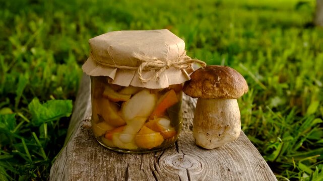 Preservation of chanterelle mushrooms in a jar. Selective focus.