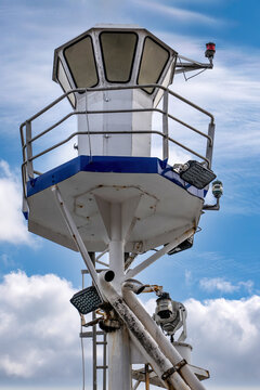 Observation lookout on a commercial fishing boat against blue sky