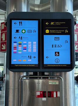 Vertical airport wayfinding display at Porto Airport