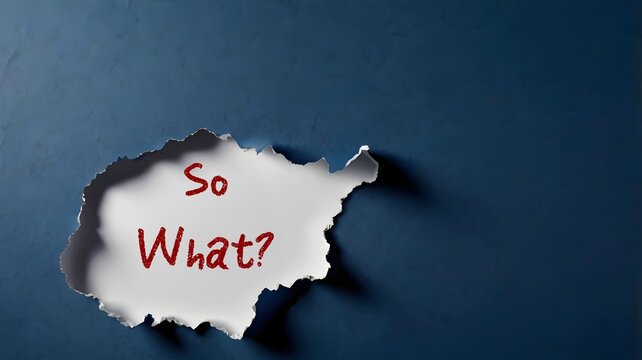 Handwriting text on a torn blue paper written SO WHAT?, to express feeling of "it's not important" or "I don't care" - should not be considered objectionable