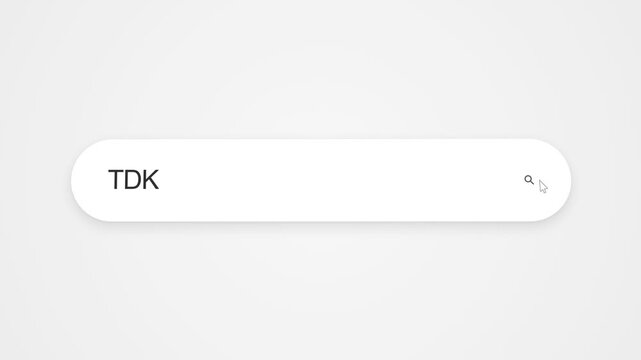 Typing TDK into an internet browser search field, showing web browsing and online search activity