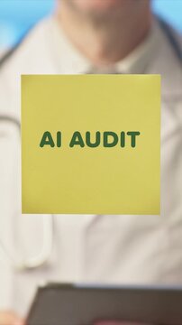 Male Doctor Placing AI Audit Sticky Note on Glass Board in Modern Healthcare Setting