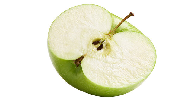 Fresh crisp green apple half with visible seeds and stem