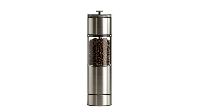 Brushed stainless steel pepper mill filled with whole black peppercorns