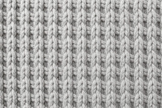 Chunky grey wool knit blanket cosy fabric top view