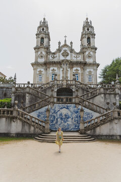 Woman walks by Santu�rio Nossa Senhora dos Rem�dios in Lamego