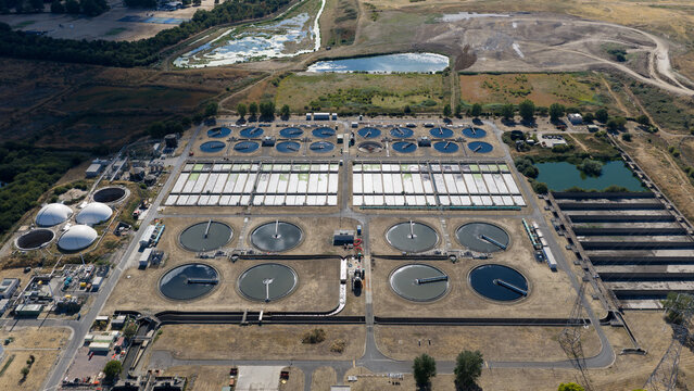 An aerial view captures a large wastewater treatment plant in London