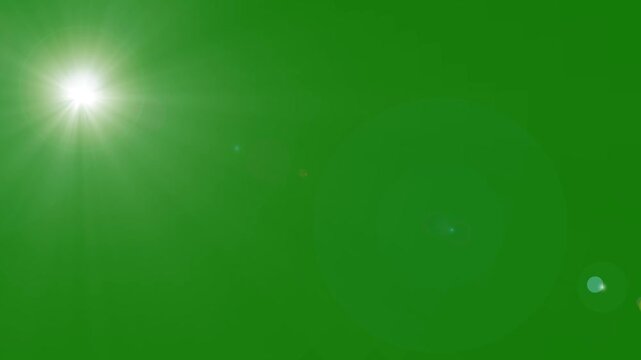 sun shining light optical lens flare effect with rotating sunlight rays on green background Chroma Key ,golden shining Sunlight rays of light optical lens flare bright light on green screen background