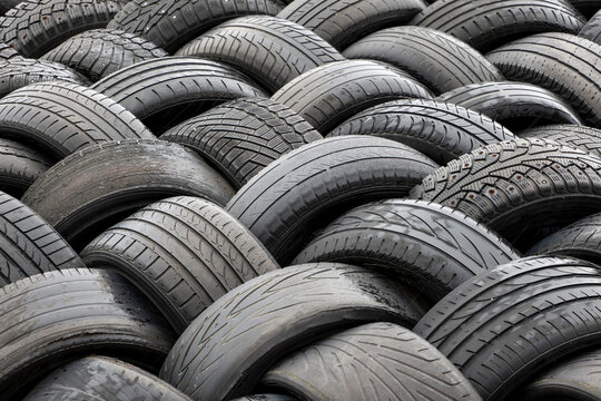 Large pile of used car tires