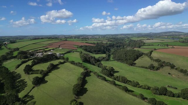 Menheniot, Cornwall, England: DRONE VIEWS: The drone flies in a north-west direction over the River Seaton valley towards Popesmill. On the horizon, top right of picture, is Trevartha Solar Farm.
