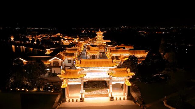 Illuminated Traditional Chinese Temple Complex at Night, Aerial View