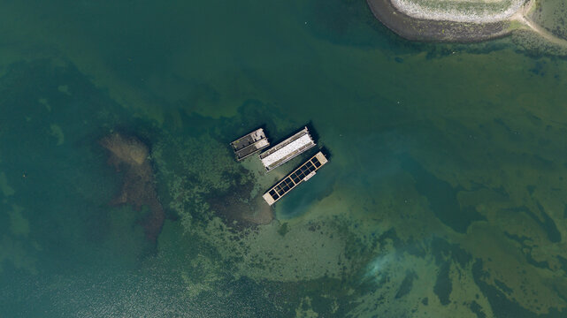 Aerial view of Caissons Inlaag Schelphoek submerged in clear water with visible seabed patterns Serooskerke Schouwen, Zeeland, Netherlands.