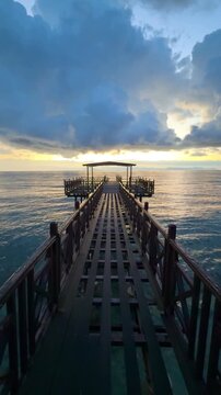 Romantic Sunrise over an Old Wooden Pier on the Greek Island of Corfu