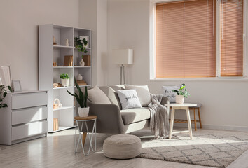 Interior design and home comfort, cozy living room with modern furniture and natural sunlight for lifestyle and real estate marketing campaigns © Pixel-Shot