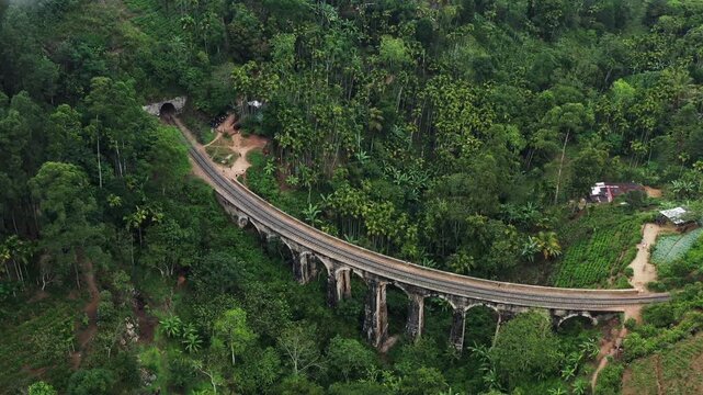 Nine Arches Bridge in a Lush Tropical Forest Aerial View