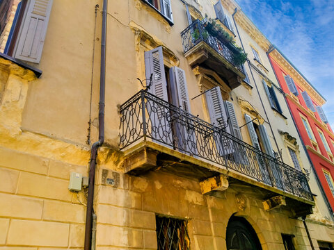 Section of the facade of an old Mediterranean building in Verona, Italy