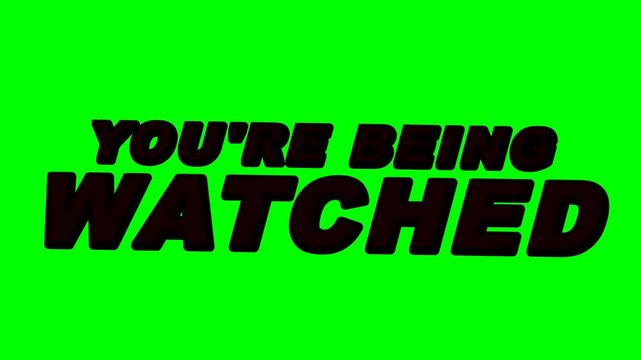 Green screen background where the ominous text 'YOU'RE BEING WATCHED' emerges from a dark silhouette, revealed slowly by a soft shadow wipe moving from left to right, while creeping closer to the came