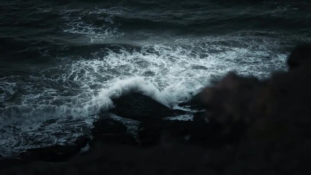 Stormy Ocean Waves and Powerful Sea Surf Under a Dramatic Sky Along the Rocky Coastline in Nature Landscape