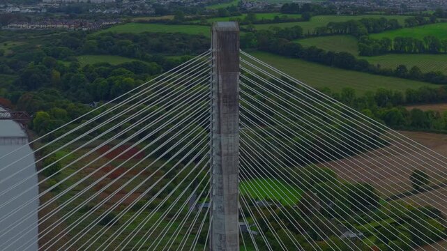 The sweeping lines of the cables give the Thomas Francis Meagher Bridge an elegant appearance, softened by the natural landscape surrounding the River Suir ,outskirts of Waterford City Ireland