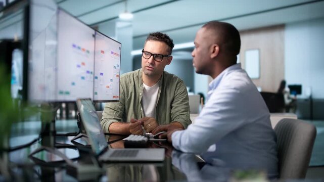 Business Analyst And Engineer Optimizing Automated Workflow