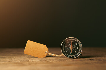 compass and wooden board on the table. © Artvibe